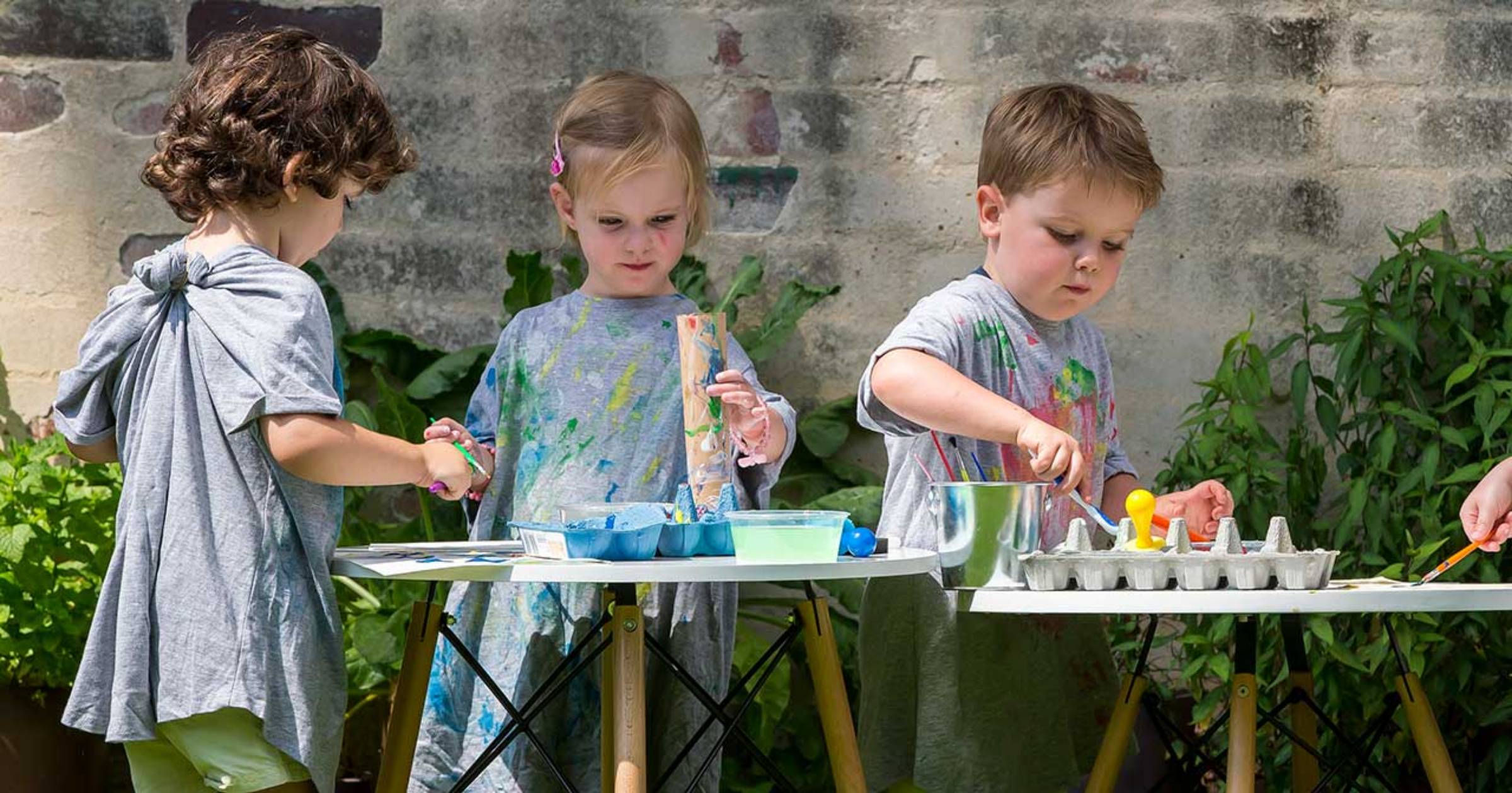 3 Children Painting Outdoors